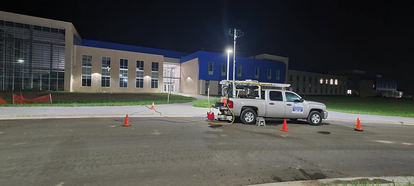 LykeNew Power Wash truck set up for after-hours cleaning at a commercial building in Salina, KS
